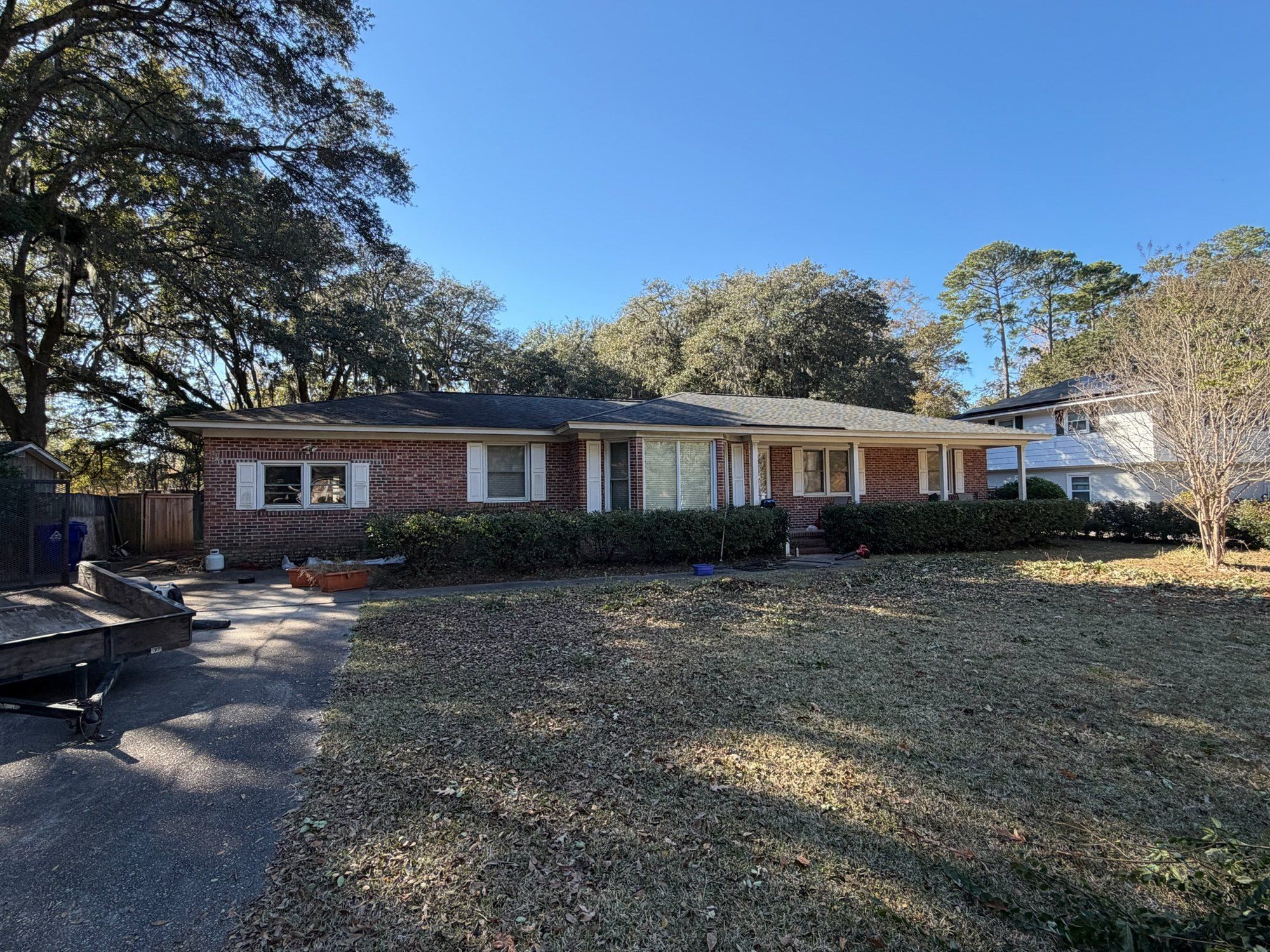 Original 1960s brick ranch exterior before renovation
